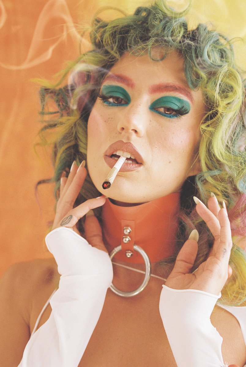 woman-with-neck-collar-smoking-joint