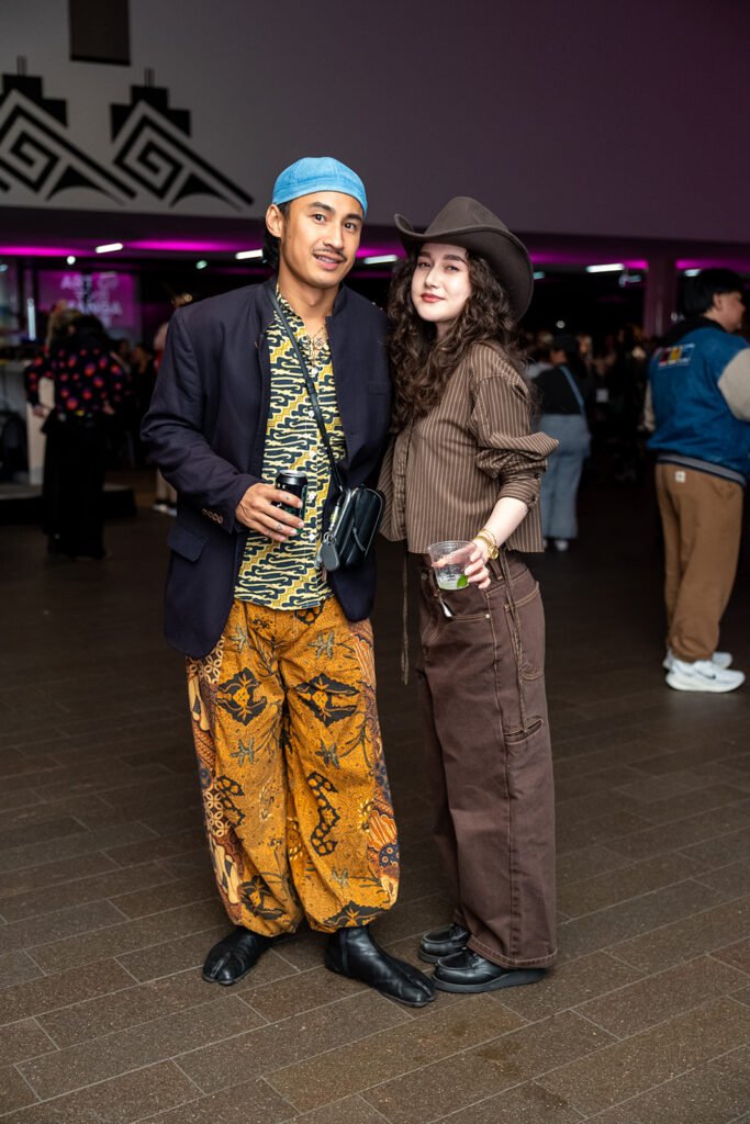 Stylish guests posing at the Late Night Editions Art of Manga event at the de Young Museum
