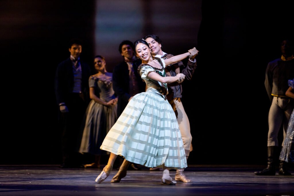 Madeline Woo dancing with ensemble onstage at San Francisco Ballet