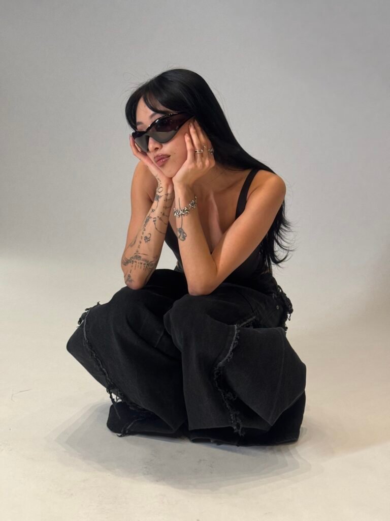 Madeline Woo portrait wearing black outfit blending ballet and fashion style