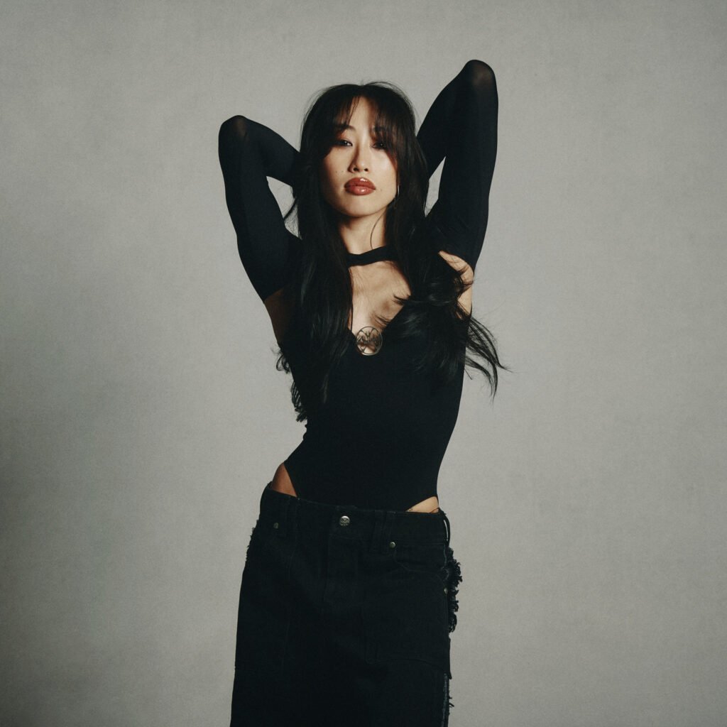 Madeline Woo portrait wearing black outfit blending ballet and fashion style