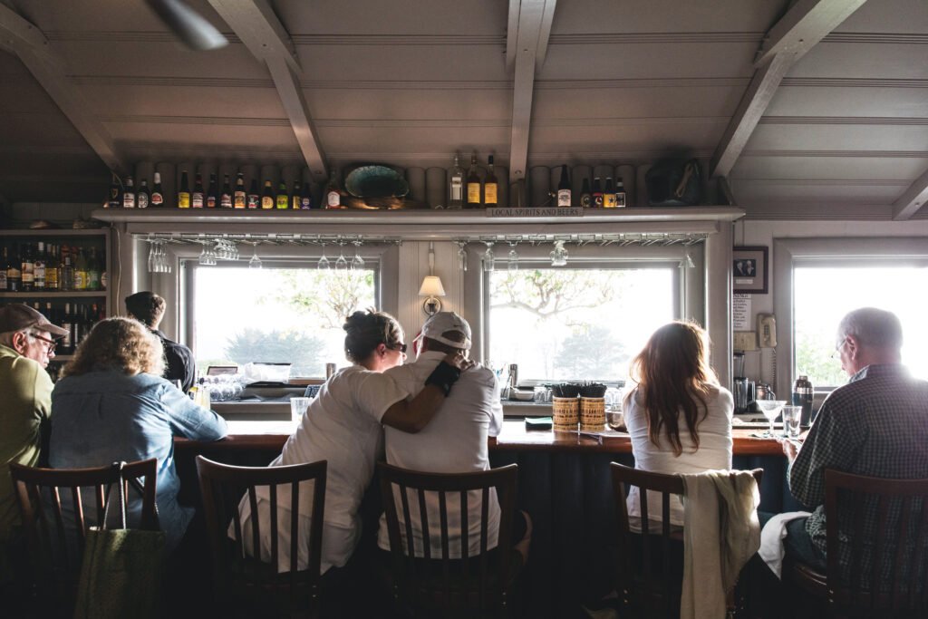 Locals and Guests Gathering at Ole's Whale Watch Bar - Photo by Aubrie Pick (1)