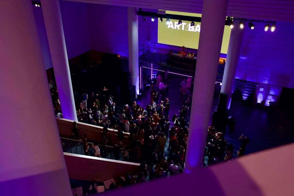 Overhead view of crowd and DJ at SFMOMA Art Bash