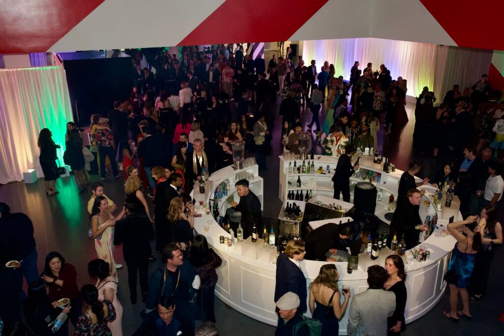 Crowded bar and guests mingling at SFMOMA Art Bash