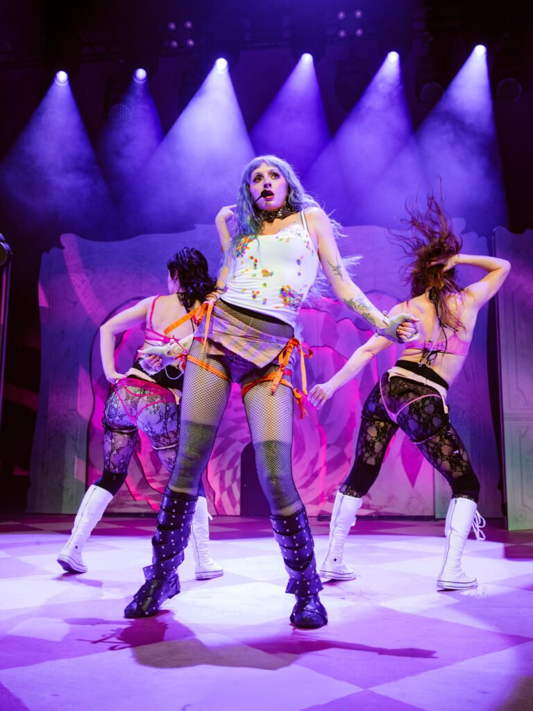 Ashnikko dancing center stage with dancers behind her live concert San Francisco