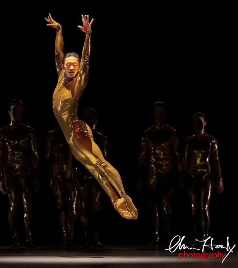 Wei Wang, principal dancer with San Francisco Ballet, stands onstage in costume during a performance
